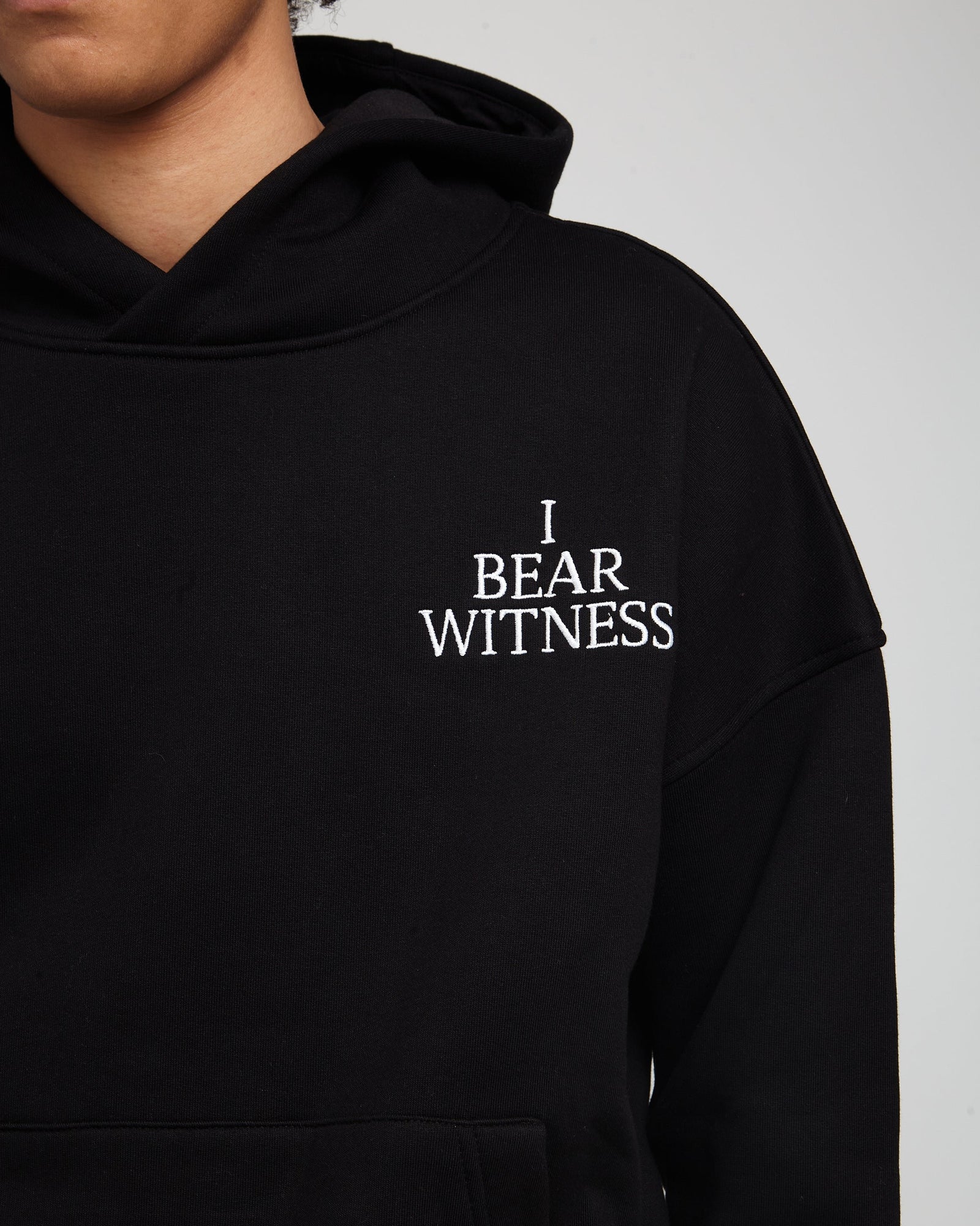Ash-Hadu Black hoodie — on-body street shot