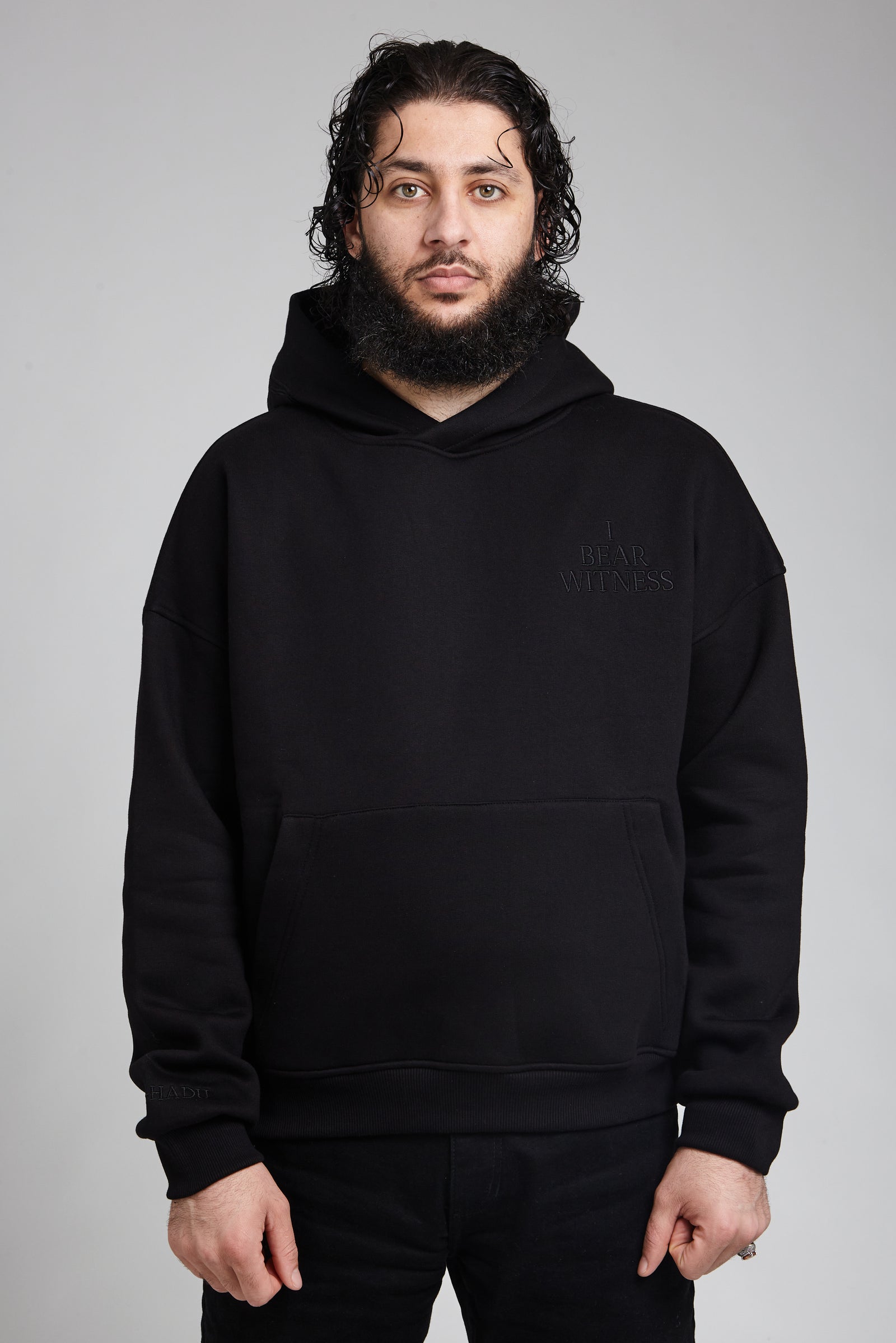 Ash-Hadu Triple Black hoodie — lifestyle pose